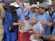 Pemkab Pati Bagikan Ribuan Paket Ikan Laut Gratis di CFD, Perkuat Gizi Warga Menuju Generasi Emas